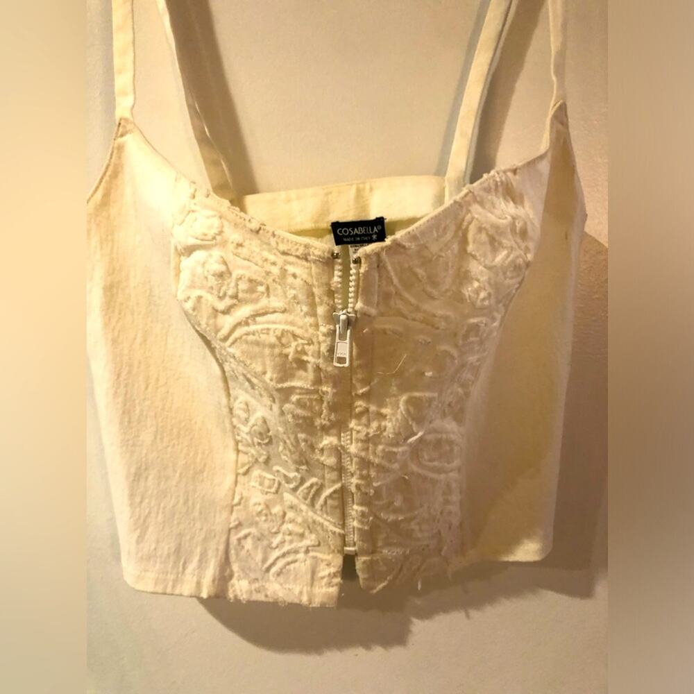 Embroidered zip front crop top in white by Cosabella made in Italy.